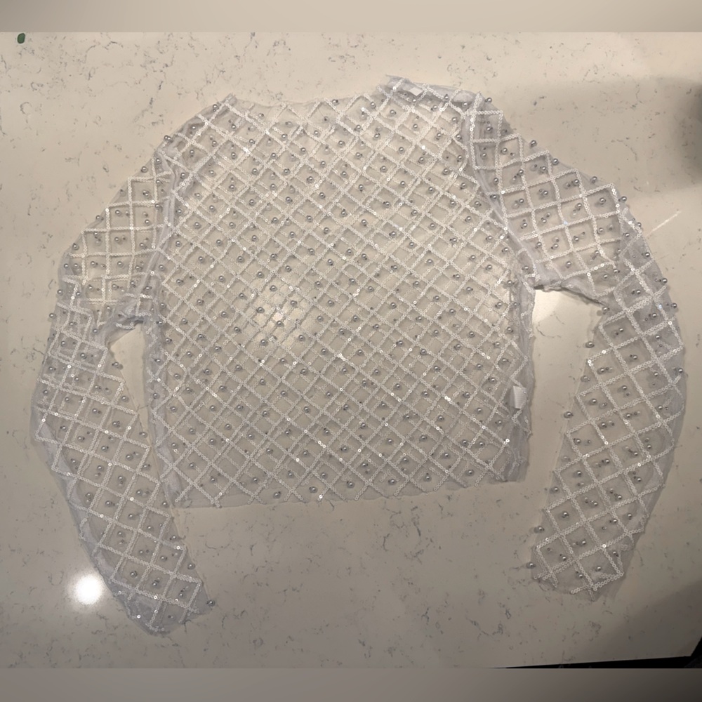 White sheer pearl and sequin top. Never worn.